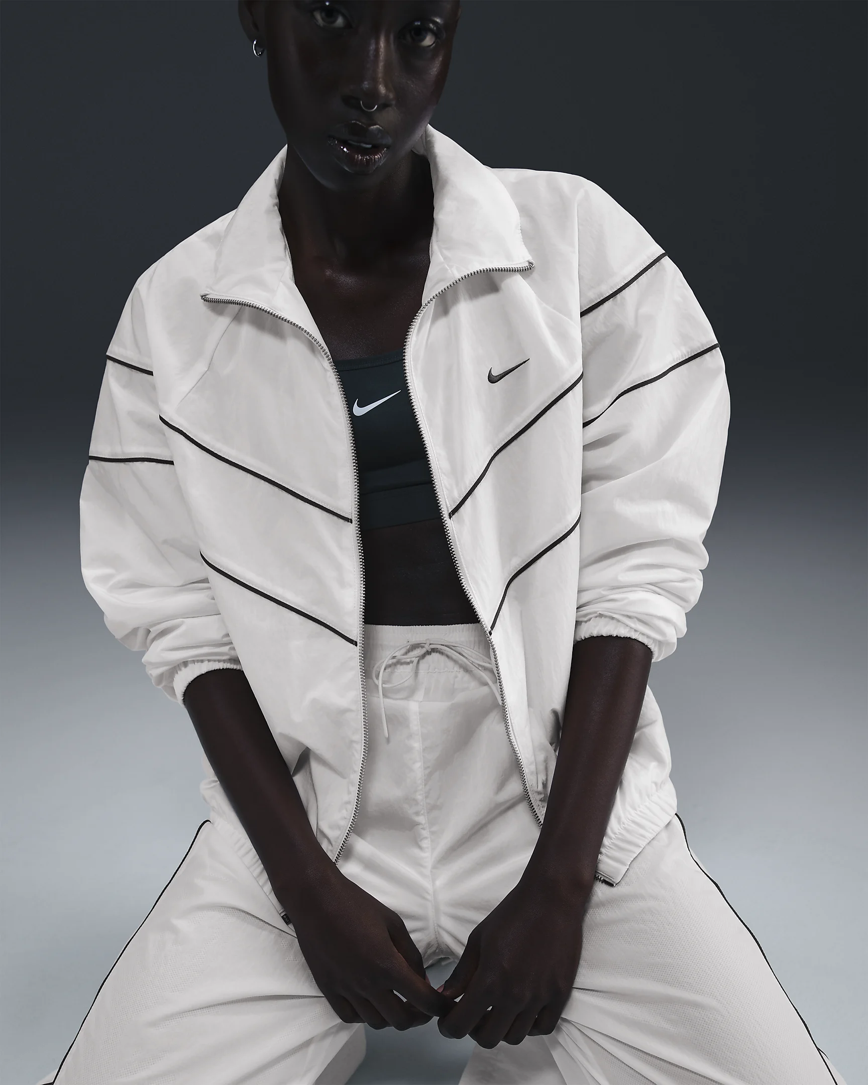 Nike Windrunner Jacket – Water-Repellent, UV Protection, & Iconic Design | AmazPromo