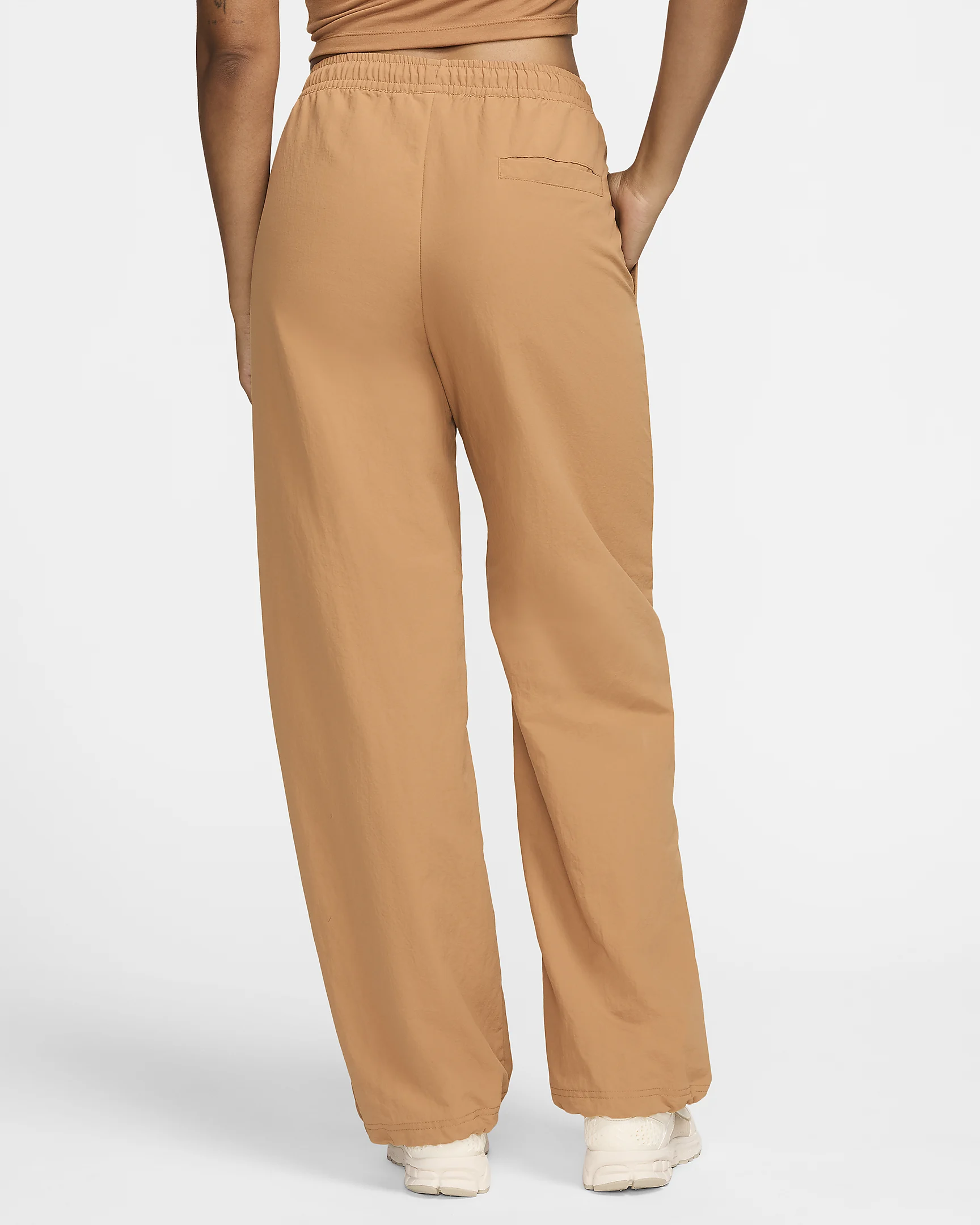 Nike Sportswear Everything Wovens Pants – Water-Repellent & Adjustable Fit – $57.97 | AmazPromo