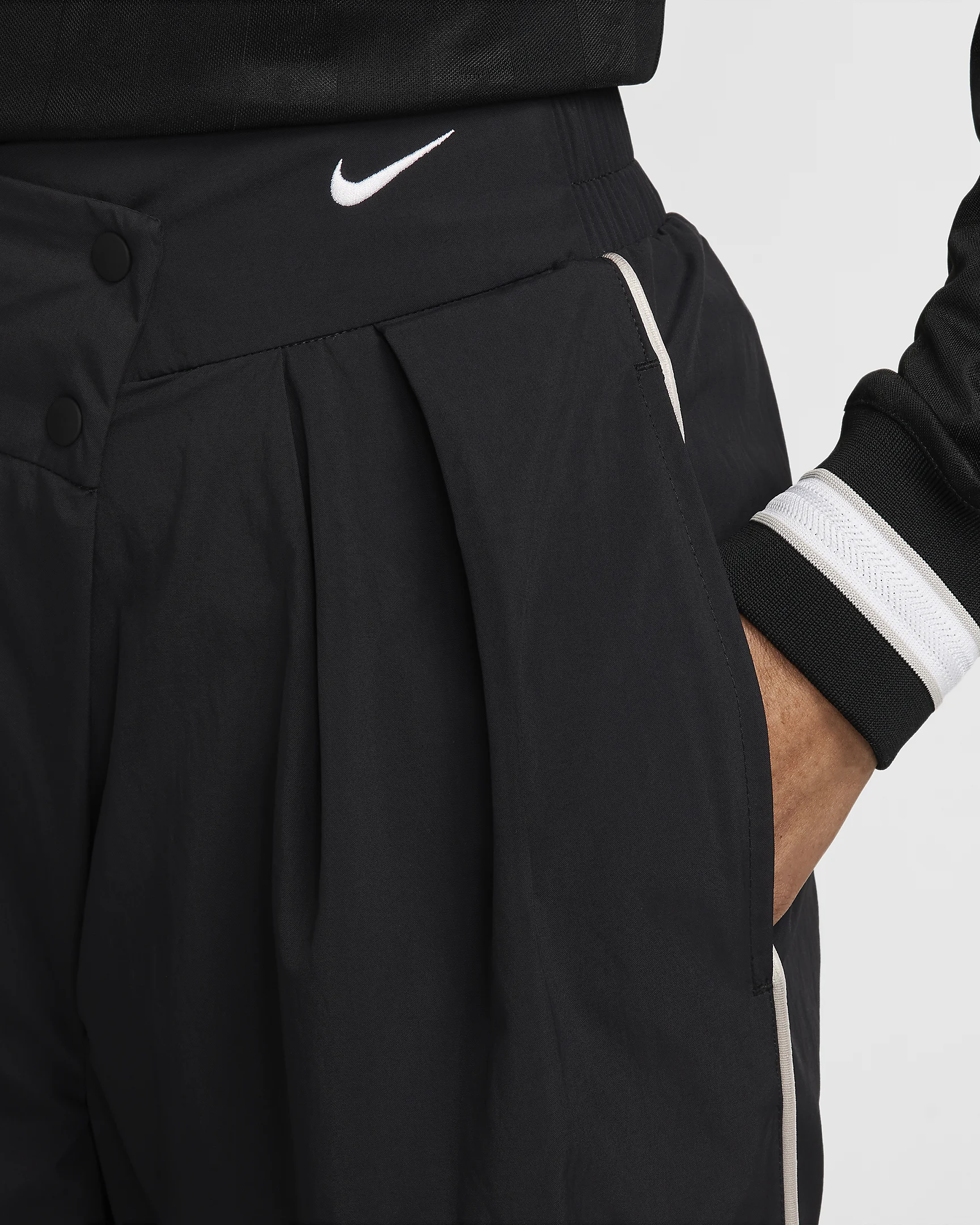 Nike Sportswear Collection Woven Trousers – Asymmetrical Waist & Water-Repellent | AmazPromo