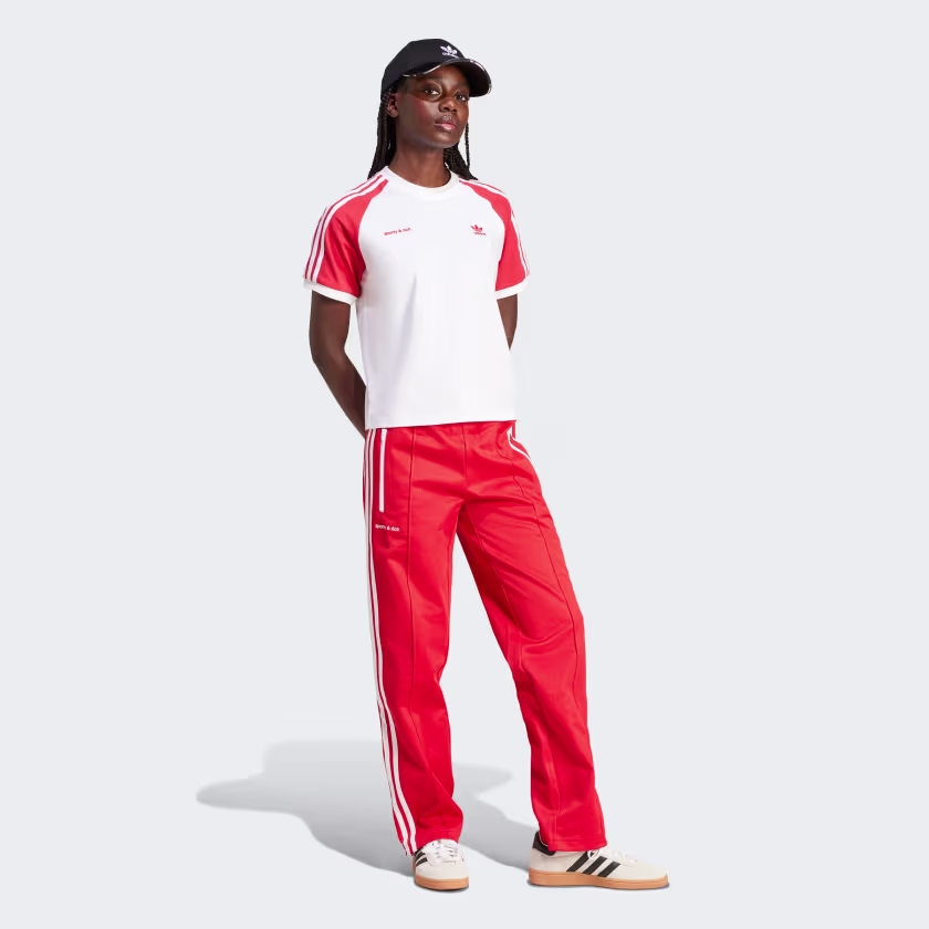 Sporty & Rich Wellness Logo Tee – Premium Cotton Unisex T-Shirt with Retro Athletic Aesthetic | AmazPromo