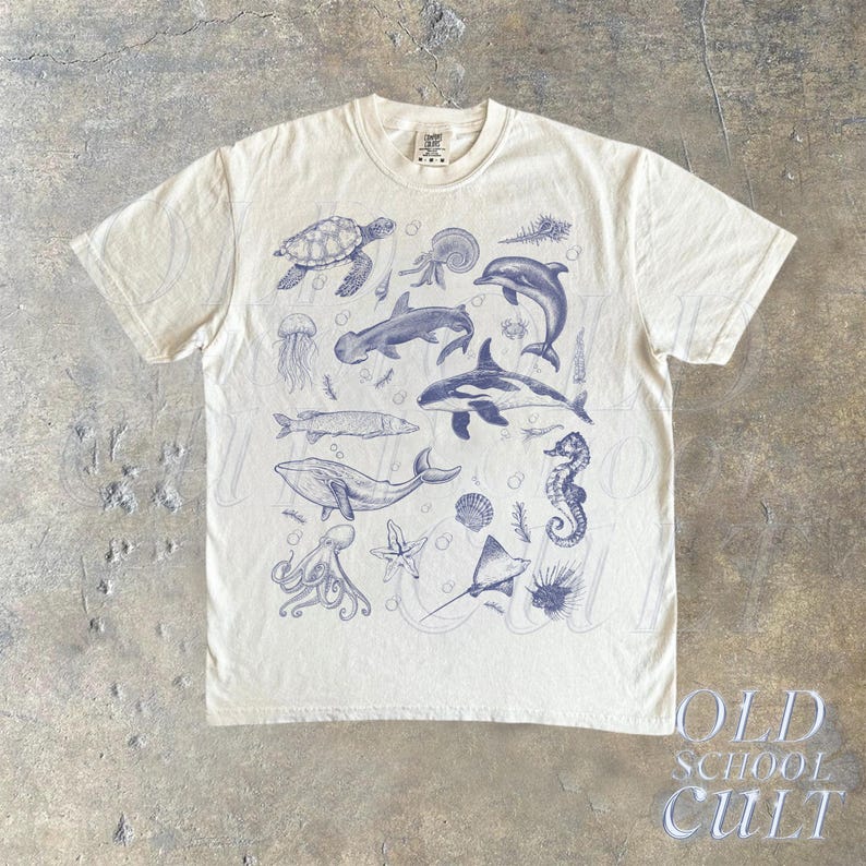 Title: Vintage Sea Life T-Shirt Ocean Animals Graphic Tee, 90s Retro Whale Dolphin Turtle Shirt | AmazPromo