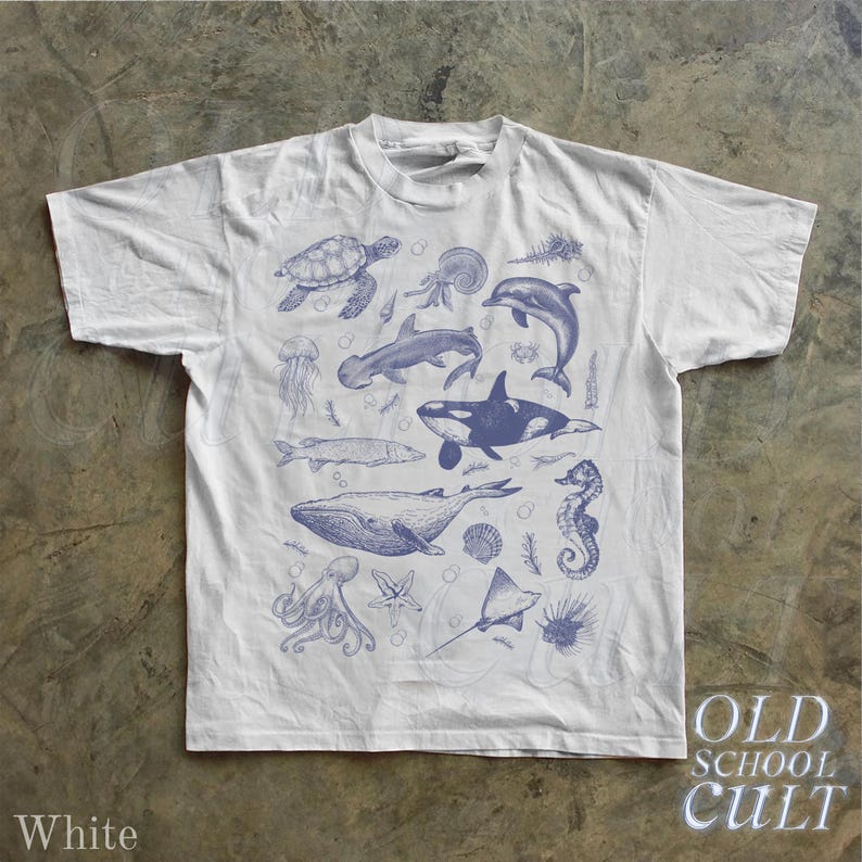 Title: Vintage Sea Life T-Shirt Ocean Animals Graphic Tee, 90s Retro Whale Dolphin Turtle Shirt | AmazPromo